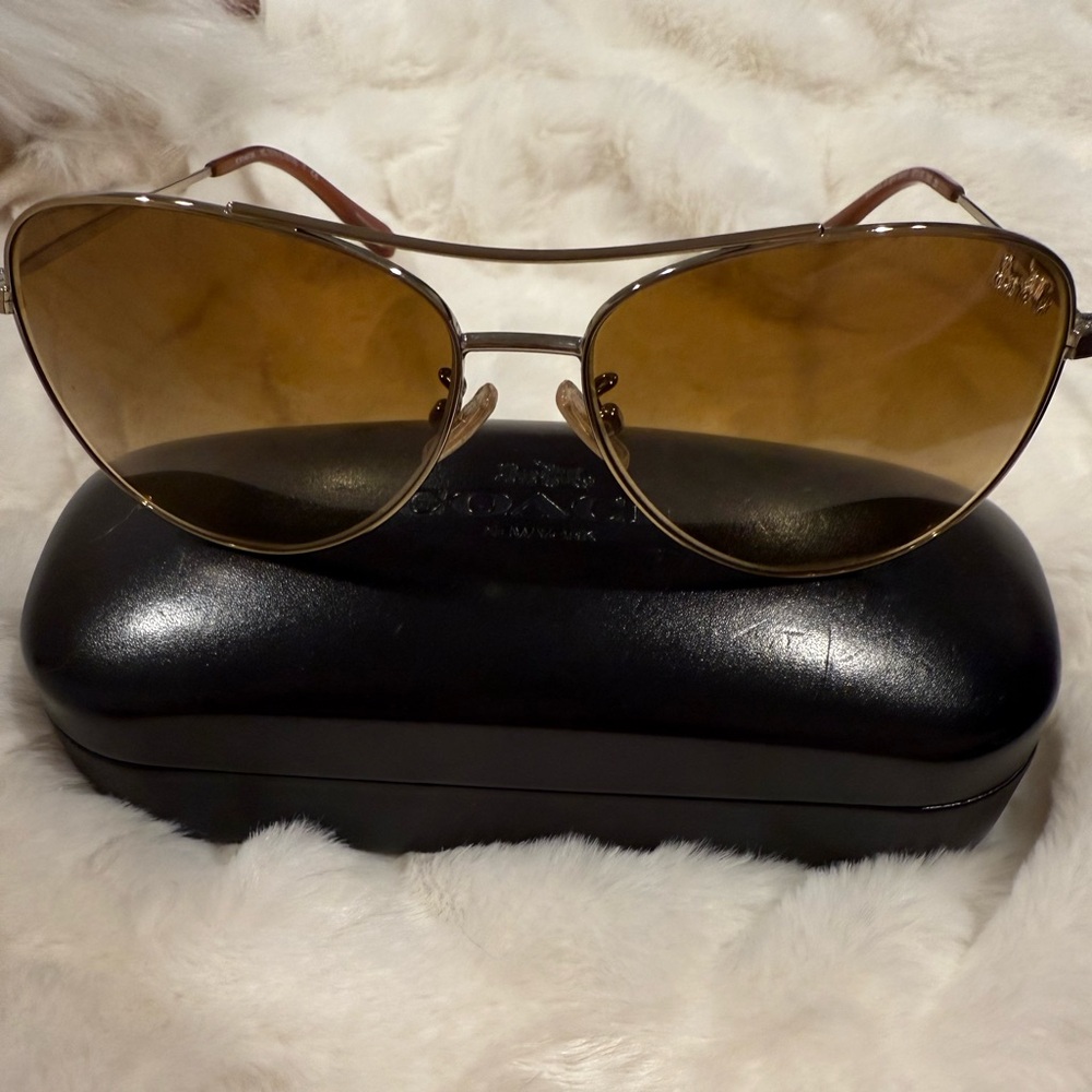 Coach Women’s gold sunglasses w/ case